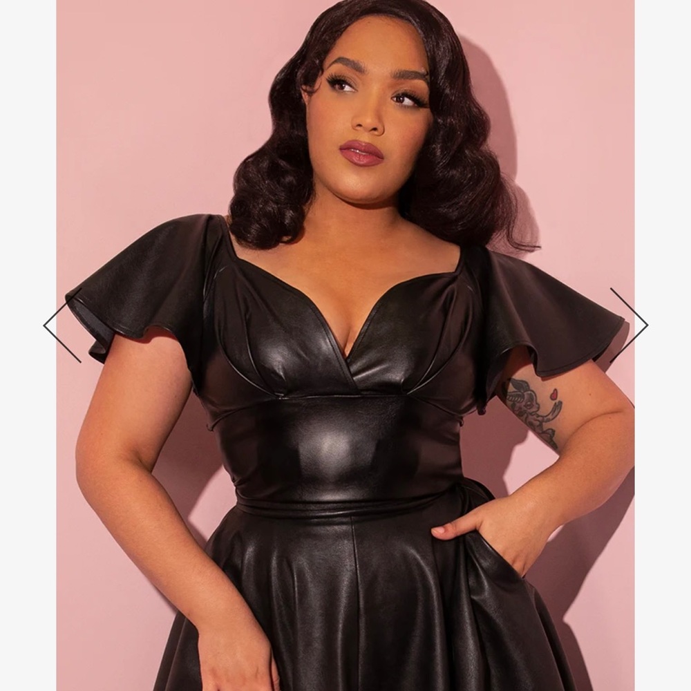 Micheline Pitt top